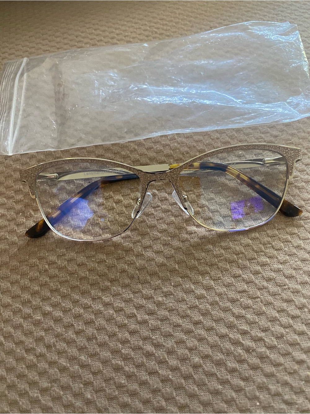 Goldtone with embellished front and side with tortoise sides